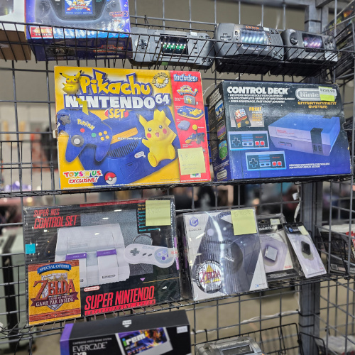Some boxed consoles