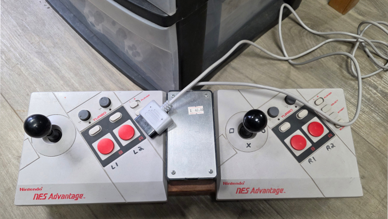 Two NES Advantages modded to what I assume is a PlayStation flight stick